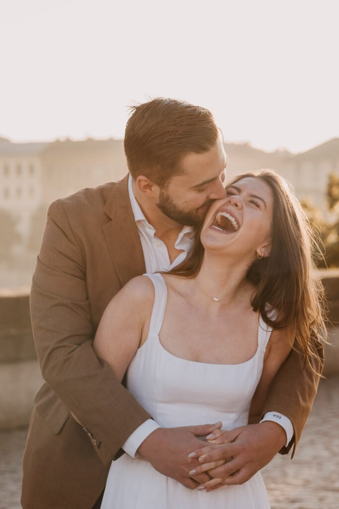 Pre wedding photoshoot in Prague, Prague wedding photographer, surprise proposal engagement, Prague photographer, couple portrait, couple laughing together